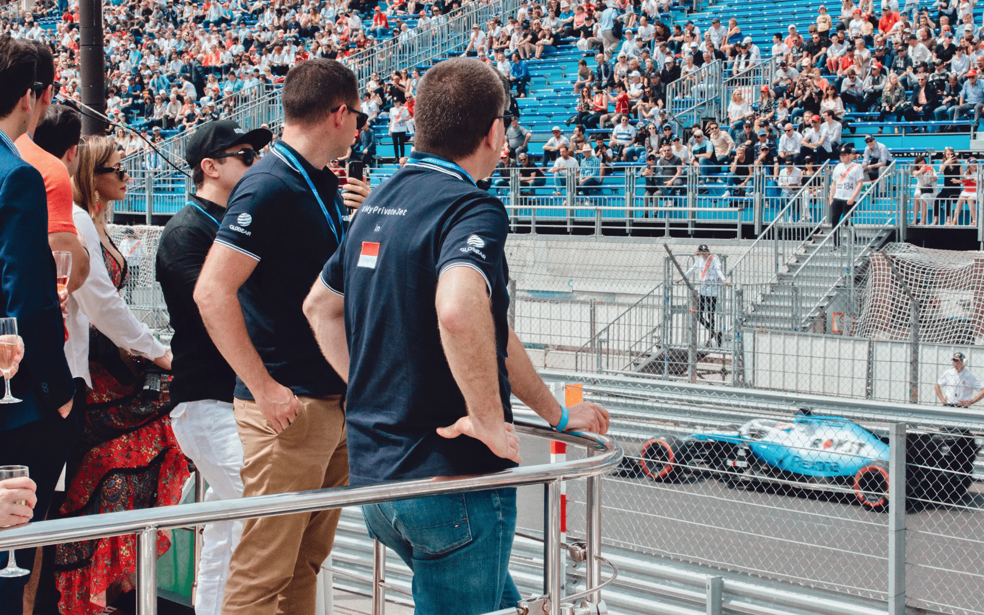 Hospitality guests watching Monaco Grand Prix action from the superyacht