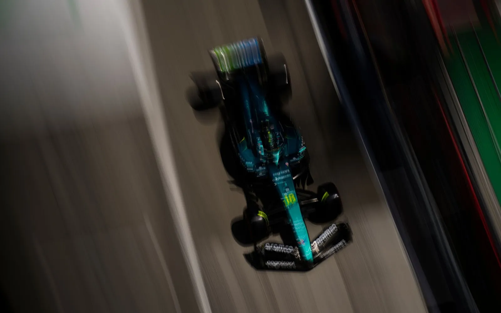 Formula 1 car at full speed on track during Grand Prix weekend