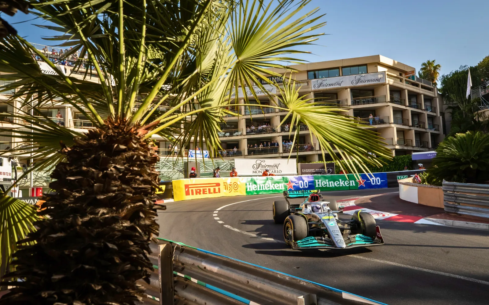 Formula 1 cars racing through the Fairmont Hairpin during the Monaco Grand Prix