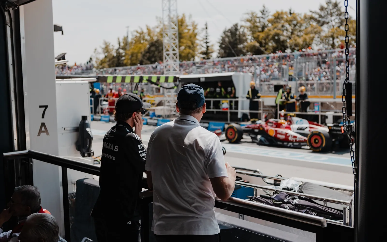 Trackside view from Gordon Ramsay at F1 Garage overlooking pit lane and Formula 1 race action