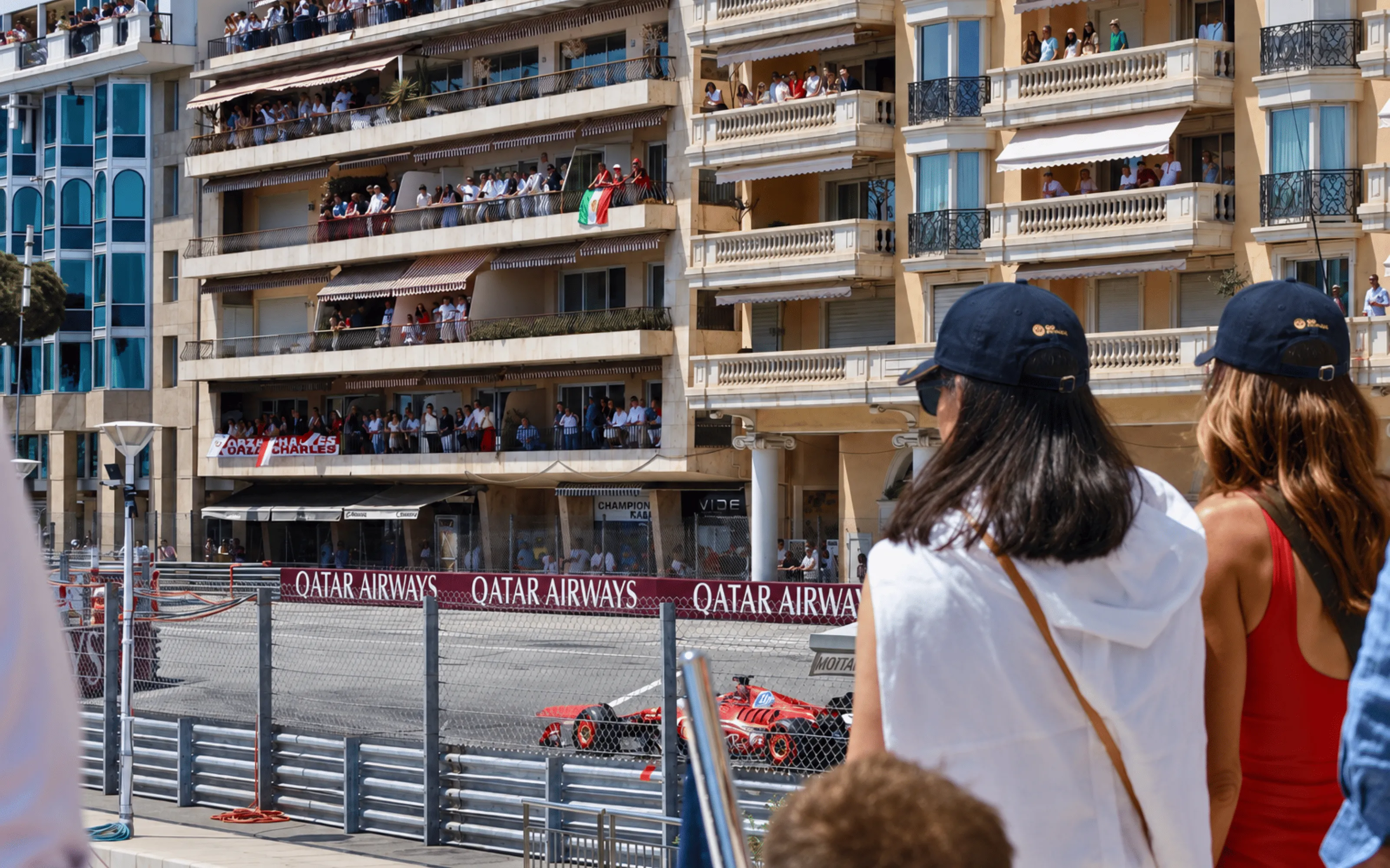 Guest overlooking Monaco Harbour from a trackside superyacht during the Monaco Grand Prix