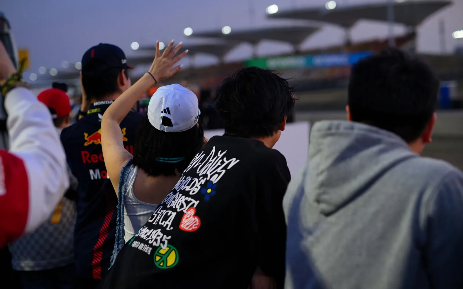 guests enjoying luxury F1 Paddock Club hospitality during race weekend