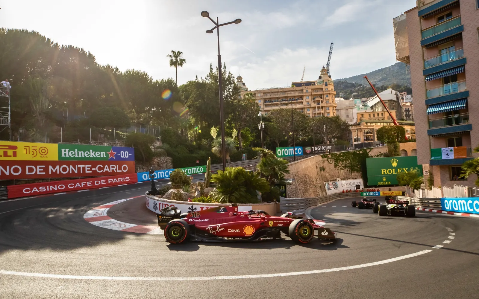 Trackside view of Formula 1 cars navigating the Fairmont Hairpin in Monaco