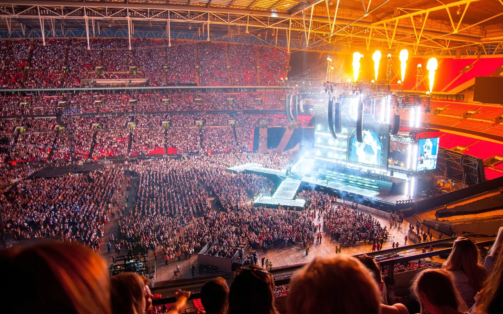 Harry Styles Wembley Stadium crowd and stage view from premium hospitality seating