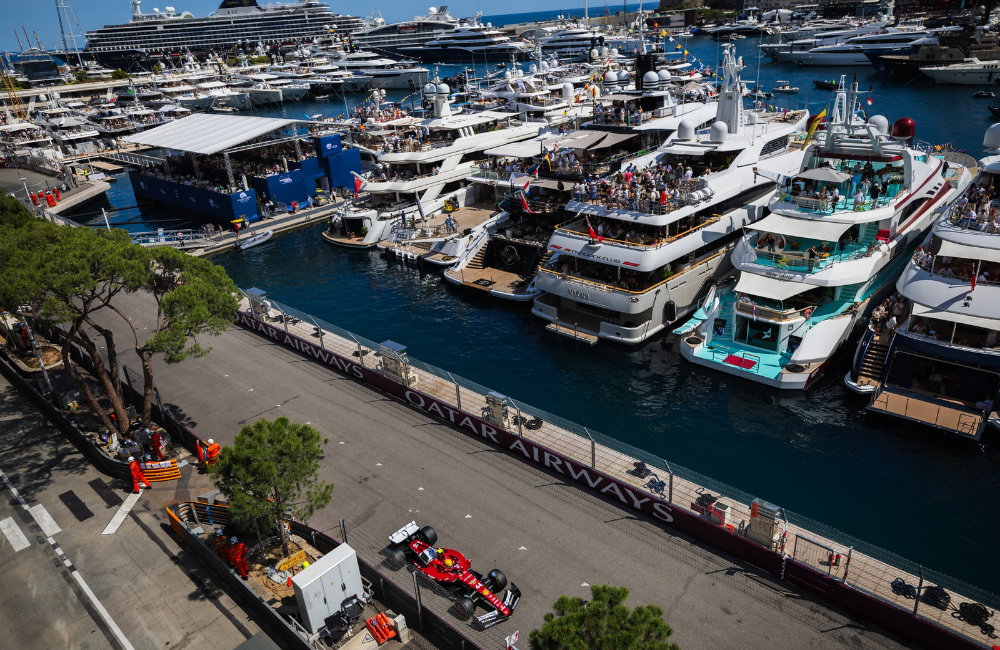 Superyachts lining the harbour beside the circuit