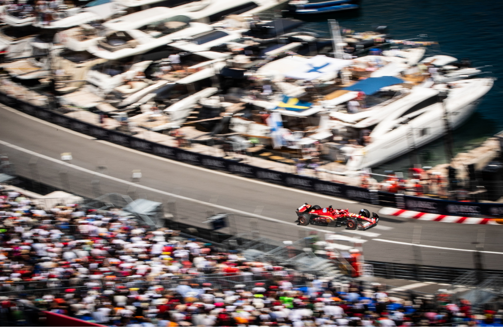 Guests on a superyacht watching the Monaco Grand Prix from the harbour